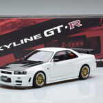 Nissan Skyline GT-R R34 Nismo Z-Tune Valkoinen MotorHelix 1:18 - image 11 of 11
