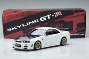 Nissan Skyline GT-R R34 Nismo Z-Tune Valkoinen MotorHelix 1:18 M83407 Metalli — kuva 11 / 11