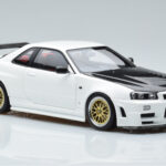 Nissan Skyline GT-R R34 Nismo Z-Tune Valkoinen MotorHelix 1:18 - image 6 of 11
