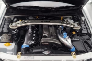 Nissan Skyline GT-R R34 Nismo Z-Tune Valkoinen MotorHelix 1:18 M83407 Metalli — kuva 9 / 11