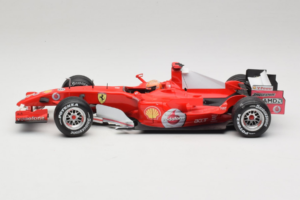 Ferrari 248 F1 #5 M. Schumacher German GP Hockenheimring 2006 Hot Wheels 1:18 J2887 Metalli — kuva 3 / 6