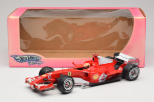 Ferrari 248 F1 #5 M. Schumacher German GP Hockenheimring 2006 Hot Wheels 1:18 J2887 Metalli — kuva 6 / 6