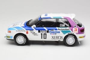 Mazda 323 GTX #10 T. Makinen / S. Harjanne 1000 Lakes Rally 1991 Otto 1:18 OT1099 Hartsi — kuva 3 / 6