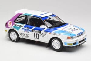 Mazda 323 GTX #10 T. Makinen / S. Harjanne 1000 Lakes Rally 1991 Otto 1:18 OT1099 Hartsi — kuva 4 / 6
