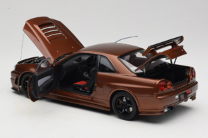 Nissan Skyline GT-R R34 Customized Metallic Bronze MotorHelix 1:18 M83414 Metalli — kuva 5 / 8