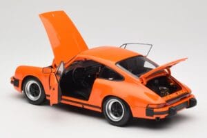Porsche 911 930 Carrera 3.2 Signal Orange Minichamps 1:18 100063025 Metalli — kuva 5 / 8