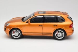 Porsche Cayenne GTS Lava Orange Norev 1:18 187535 Metalli — kuva 4 / 8