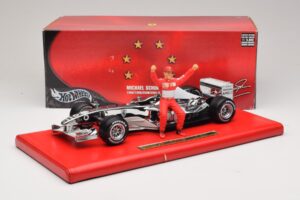 Ferrari F2004 #1 M. Schumacher Six Time World Champion 2004 Kromi Hopea Hot Wheels 1:18 C7332 Metalli — kuva 6 / 6