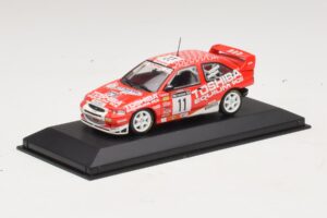 Ford Escort Cosworth Toshiba #11 A. Vatanen / Freeman 1994 Minichamps 1:43 430981811 Metalli — kuva 2 / 4